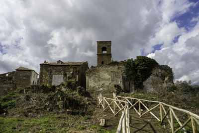 Low angle view of old building against sky