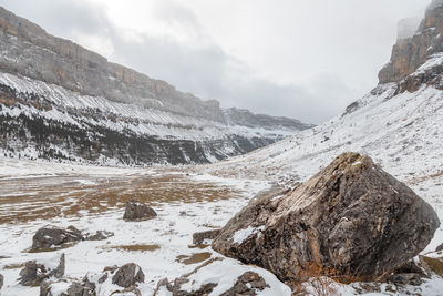 Scenic view of snowcapped mountains against sky