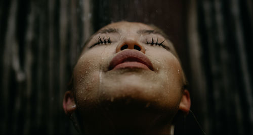 Close-up of woman with eyes closed