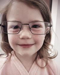 Close-up portrait of smiling girl