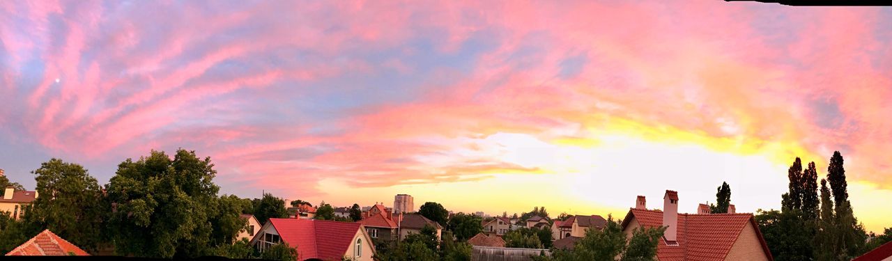 building exterior, architecture, sky, cloud - sky, built structure, tree, orange color, building, sunset, plant, nature, city, no people, panoramic, residential district, outdoors, beauty in nature, house, travel destinations, multi colored, romantic sky