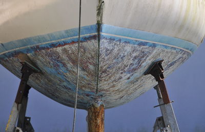 Low angle view of metallic structure against sky