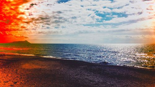 Scenic view of sea against sky during sunset