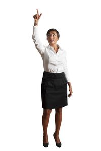 Portrait of smiling woman standing against white background