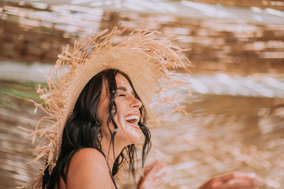 Portrait of smiling young woman outdoors