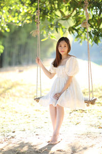 Portrait of smiling young woman outdoors