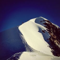 Scenic view of snow covered mountains