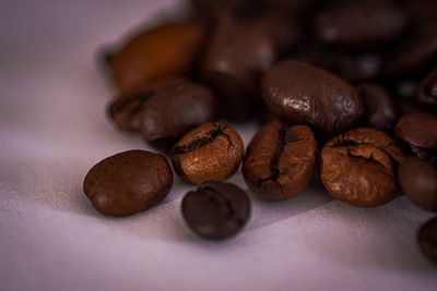 Close-up of coffee beans on table