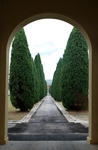 Scenic view of garden through archway