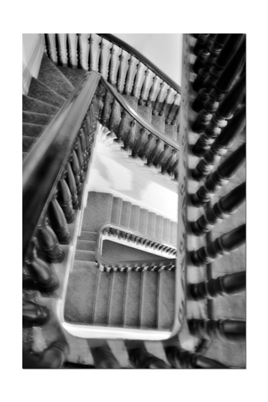 HIGH ANGLE VIEW OF SPIRAL STAIRCASE ON BUILDING