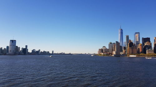 Buildings in city at waterfront