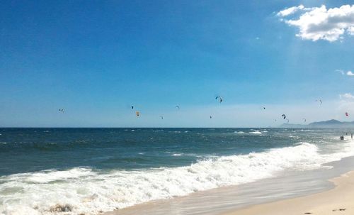 Scenic view of sea against blue sky