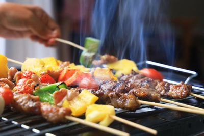 Close-up of meat on barbecue grill