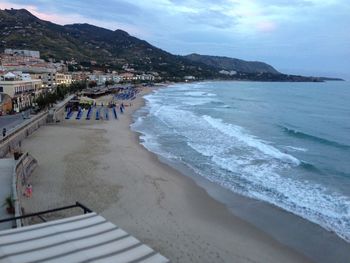 Scenic view of sea against cloudy sky
