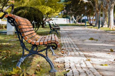 Empty benches in park
