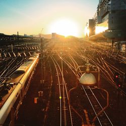 High angle view of railroad tracks at sunset