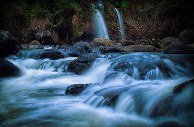 Scenic view of waterfall in forest