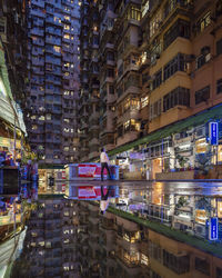 Buildings in city at night