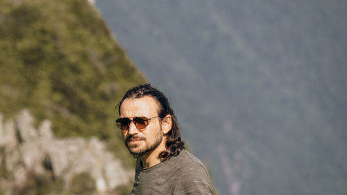 Portrait of young man wearing sunglasses