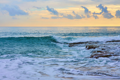 Scenic view of sea against sky during sunset