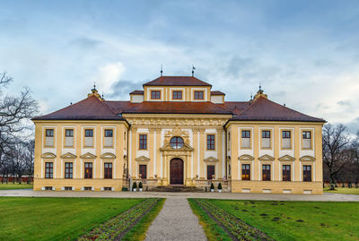 Building against cloudy sky