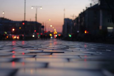 View of city street at sunset