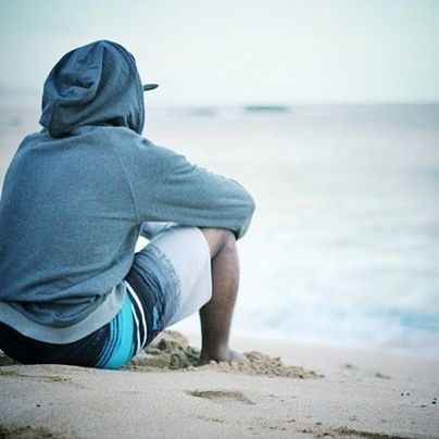 beach, water, sea, rear view, lifestyles, shore, leisure activity, sand, men, relaxation, casual clothing, focus on foreground, tranquility, nature, standing, beauty in nature, tranquil scene, vacations