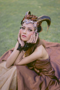 Portrait of smiling young woman wearing traditional clothing