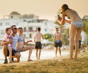 Rear view of friends looking away