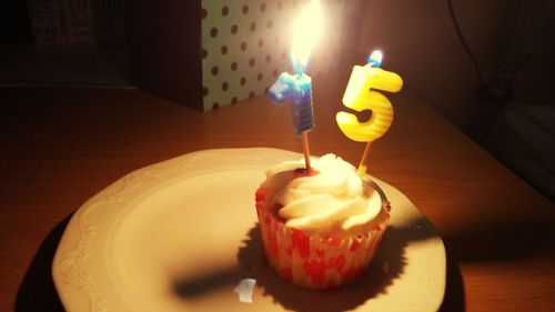 Close-up of cupcakes on cake