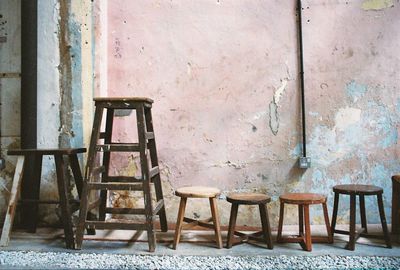 Chairs and table in abandoned room