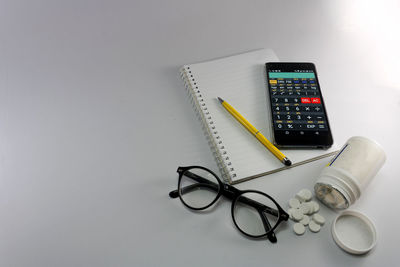 High angle view of eyeglasses on table