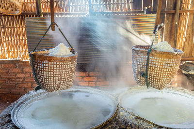 Rock salt process with ancient method for boiling brine into salt with smoke and light.