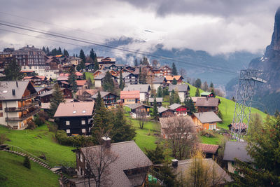 High angle view of houses and buildings in city