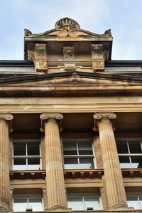 Low angle view of historic building against sky