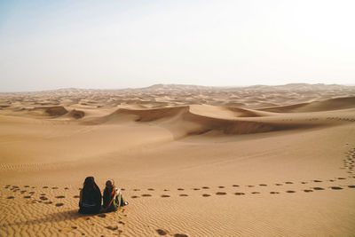 Panoramic view of desert against sky