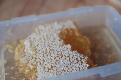 Close-up of dessert in container on table