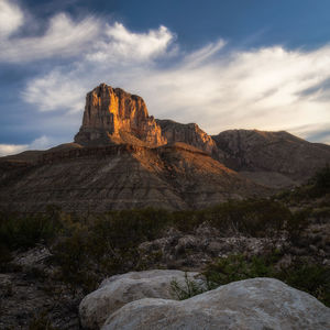 Rock formations on mountain against sky