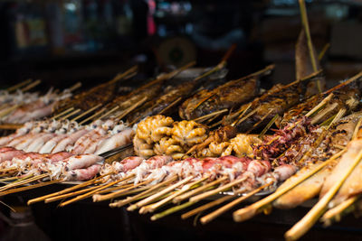 Close-up of meat on barbecue grill