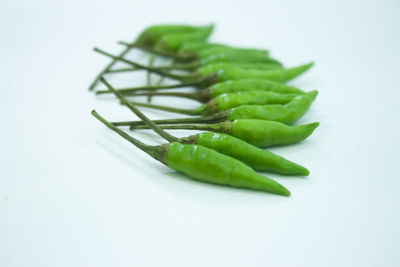 Close-up of carrots on white background