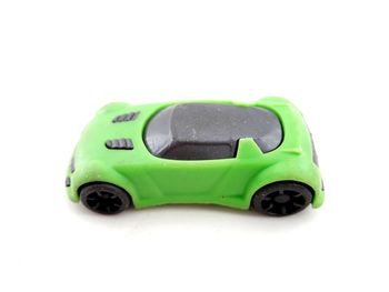 Close-up of green toy car on white background
