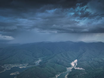 Aerial view of heavy rain over mountain , hope and dream concept