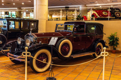 Vintage car on floor in city at night