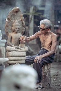 Close-up of statue against blurred background