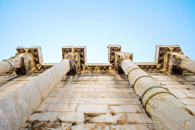 Low angle view of old ruin building against sky