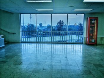 Reflection of building on glass window