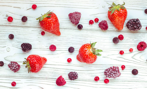 High angle view of strawberries on table