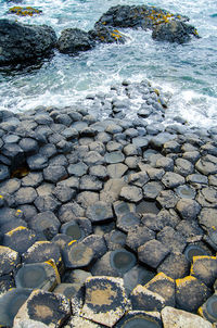 High angle view of stones on beach