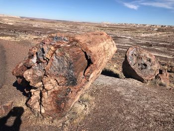 Rock formation on land against sky