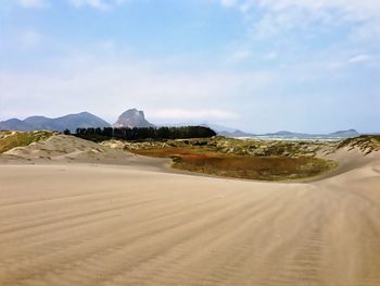 Scenic view of desert against sky
